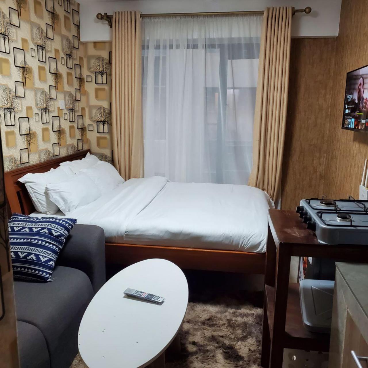 Lovely & Cozy Compact Studio Near Airport With Rooftop View Apartamento Nairobi Exterior foto