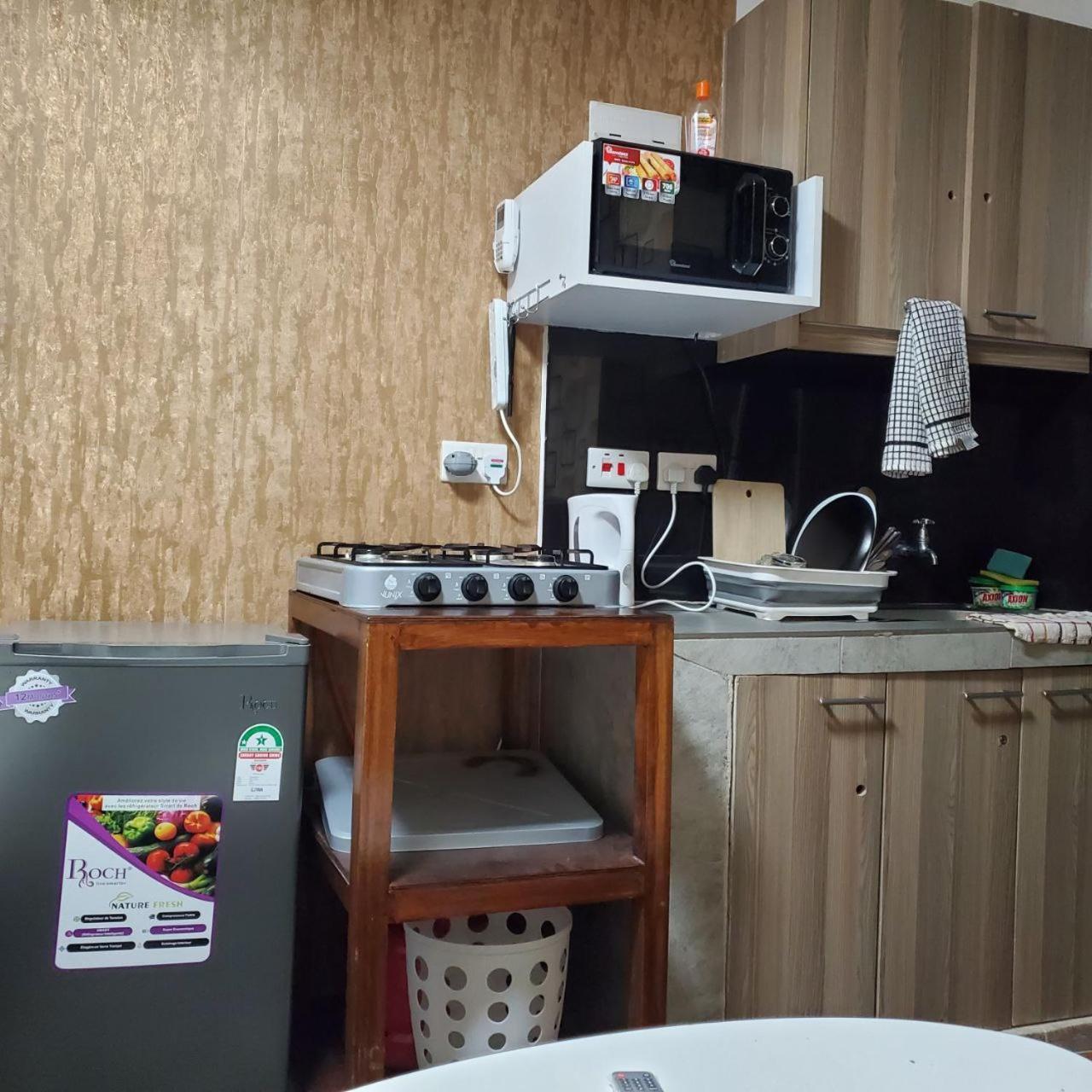 Lovely & Cozy Compact Studio Near Airport With Rooftop View Apartamento Nairobi Exterior foto